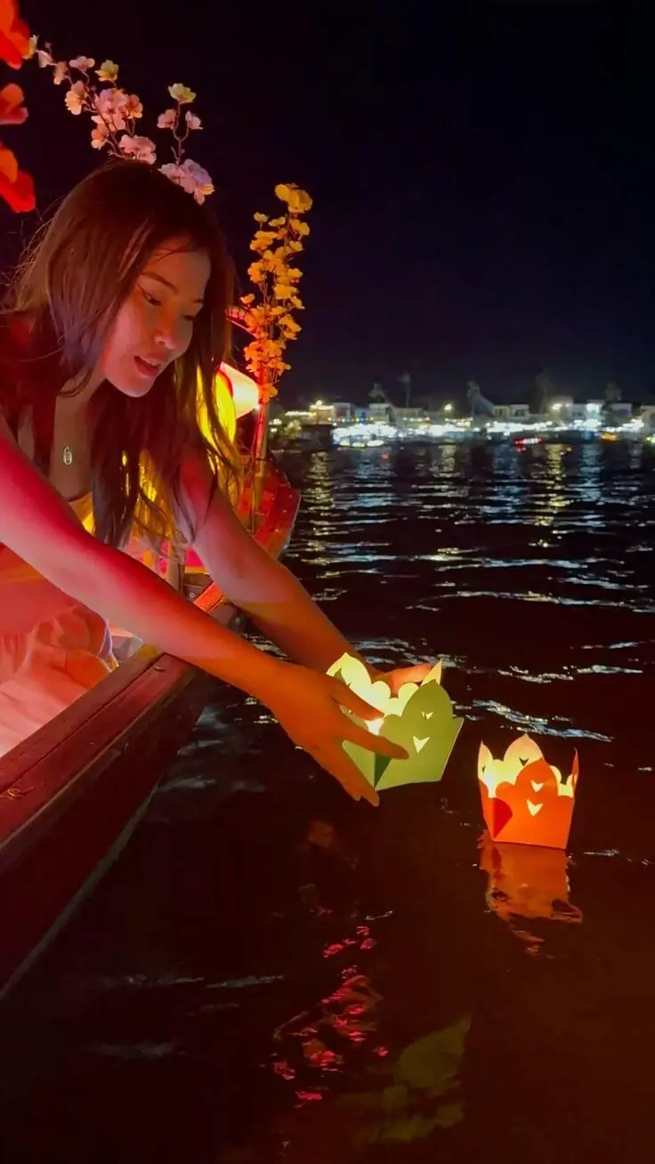 Lantern-lit boats on Thu Bon River Hoi An